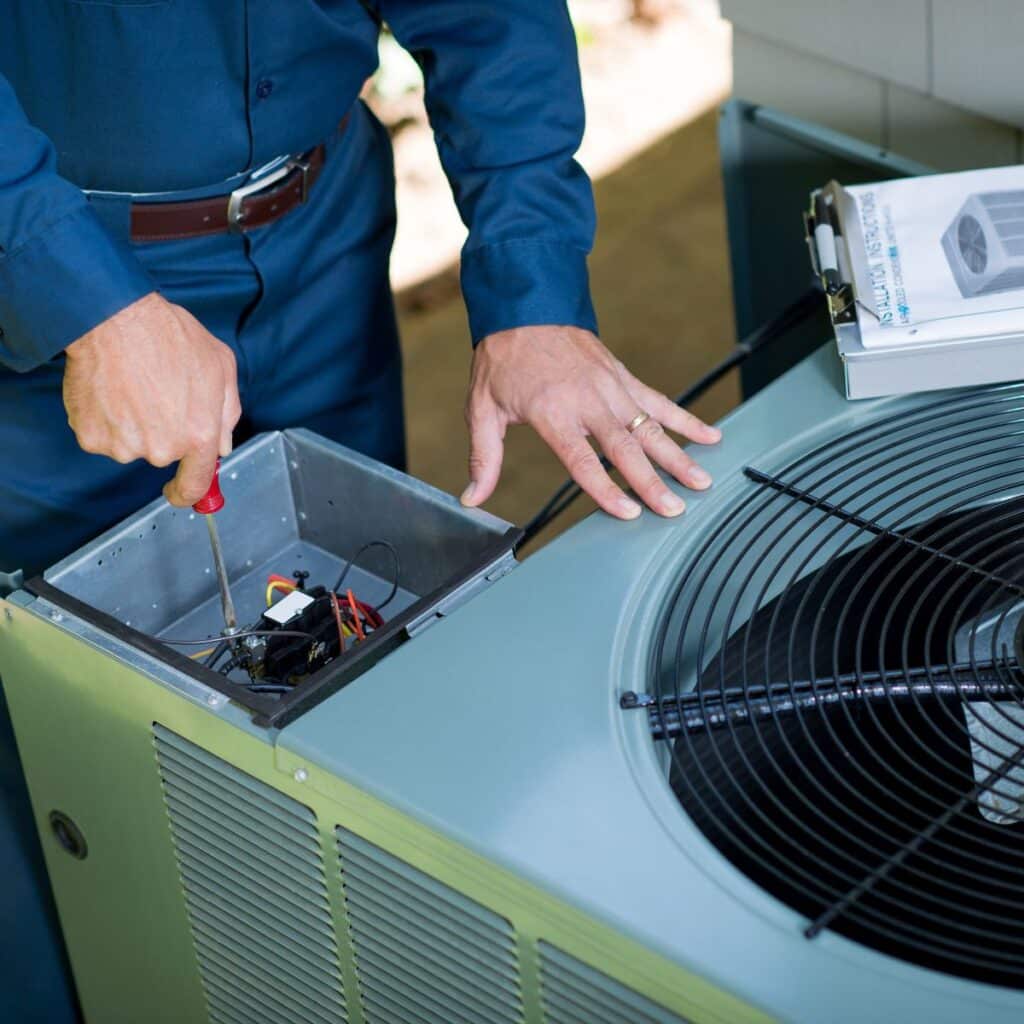 McCullough worker doing a AC repair