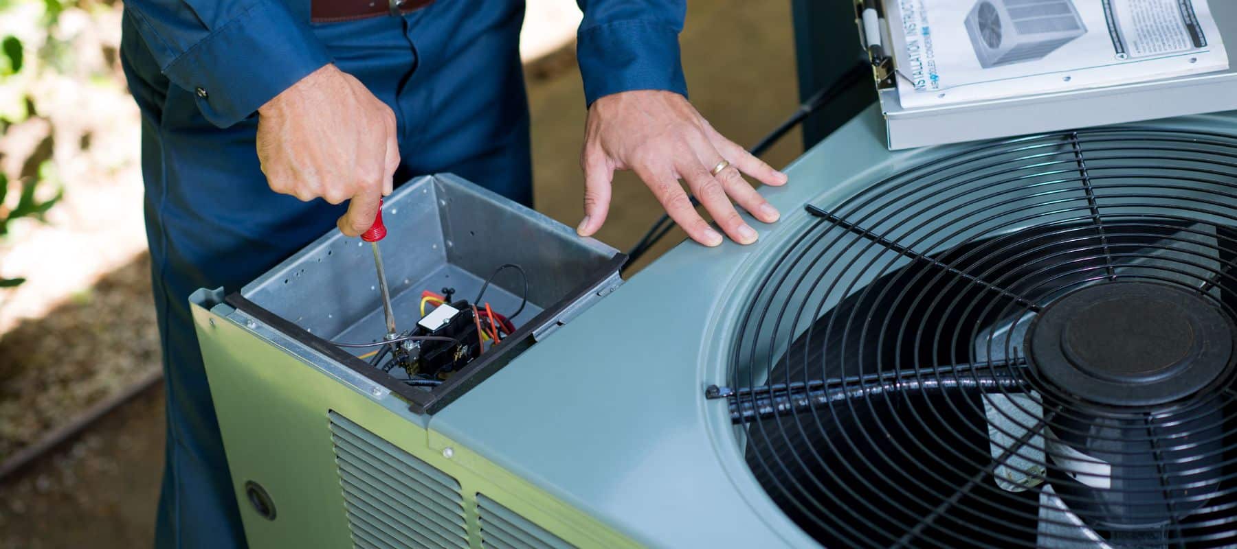 McCullough worker doing an AC repair