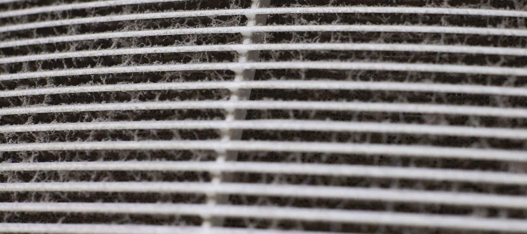 close up picture of dust on a AC unit