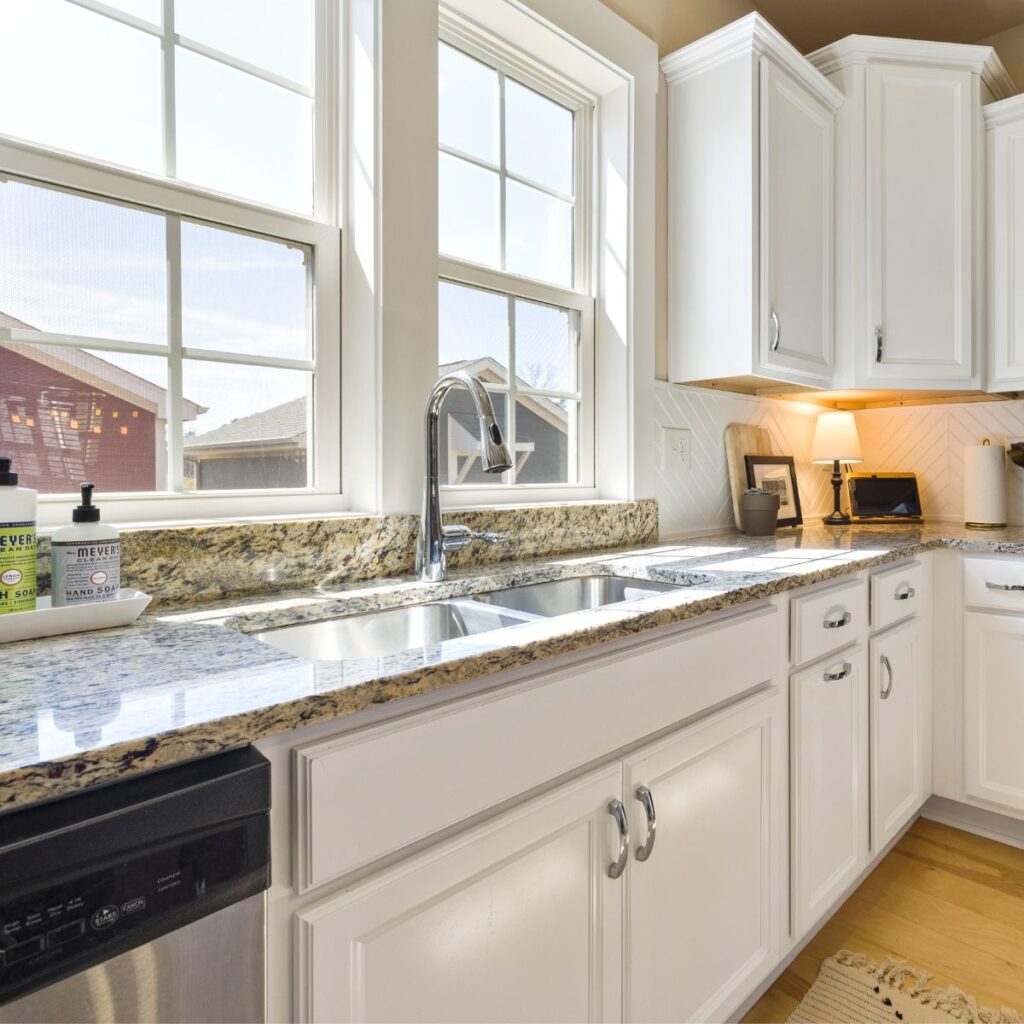 granite counter tops with white fixtures