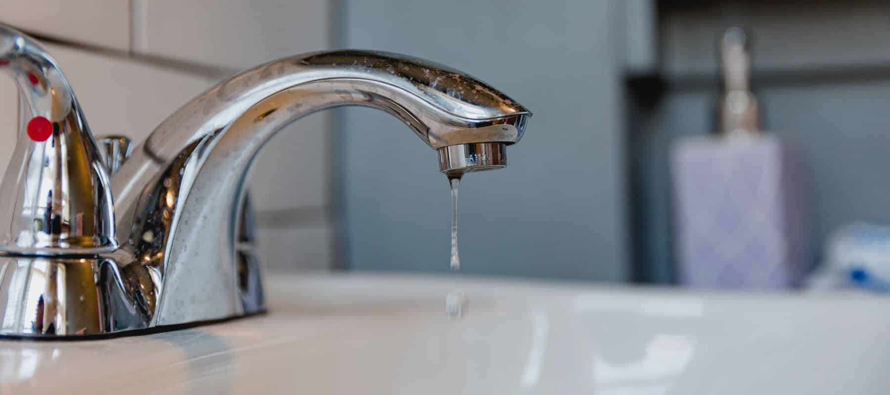water faucet with a drip